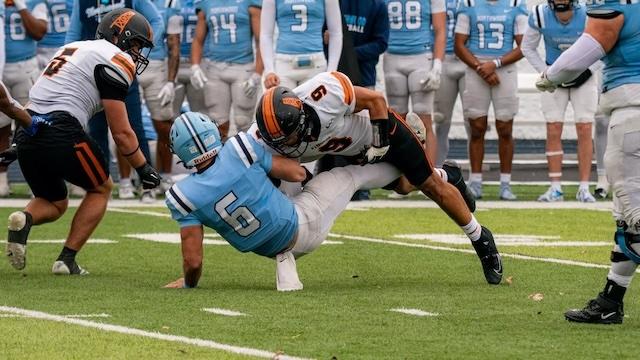 A Findlay defense buries his opponent in DII football.